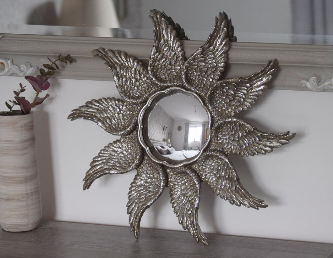 Mirrored winged plaque